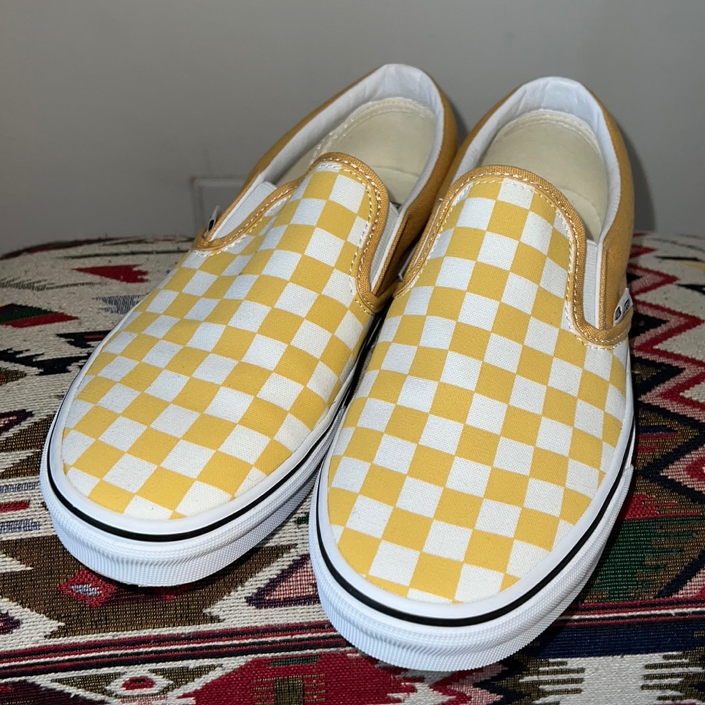 Almost new Vans Slip Ons. Yellow and White checkered. No box.